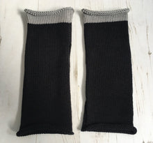 Load image into Gallery viewer, Flat Lay of Black Cotton Knitted Wrist Warmers with Grey Trim