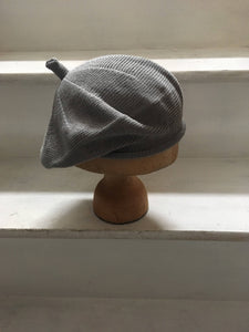 Grey Cotton Knitted Beret with Top Tab and Rolled Hem, by Lord and Taft